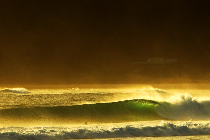 a sunset over some water