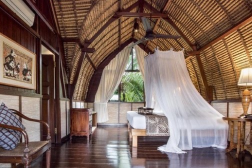 a room filled with furniture and a fireplace