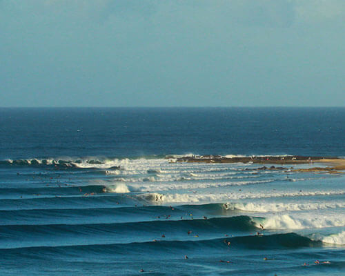 a body of water next to the ocean