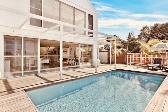 a pool next to a building