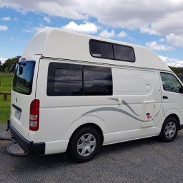 a van parked on the side of a road