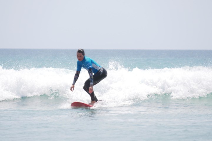 a woman surfing
